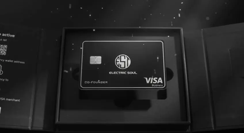 Electric Soul card resting in its black presentation box